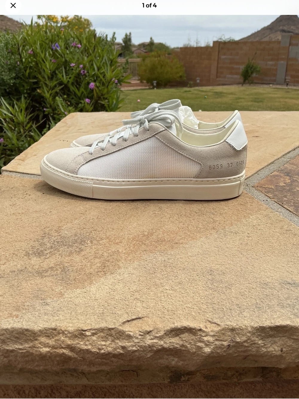 WOMAN by COMMON PROJECTS Minimalist Women’s Low-Top Sneakers in Off-White/Cream